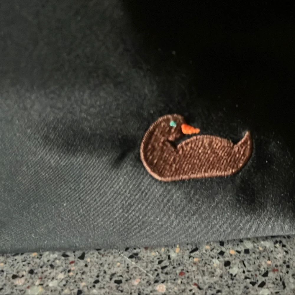 Dooney & Bourke Black Handbag with Brown Leather Strap and Hot Pink Interior - Picture 3 of 16